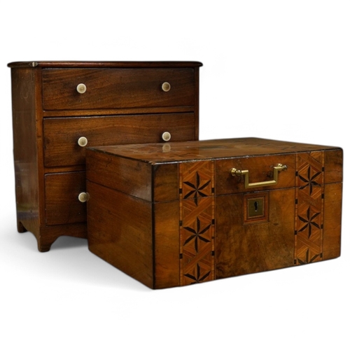 406 - A small 19th century mahogany chest of three drawers having bone handles, width 26cm, height 26cm an... 