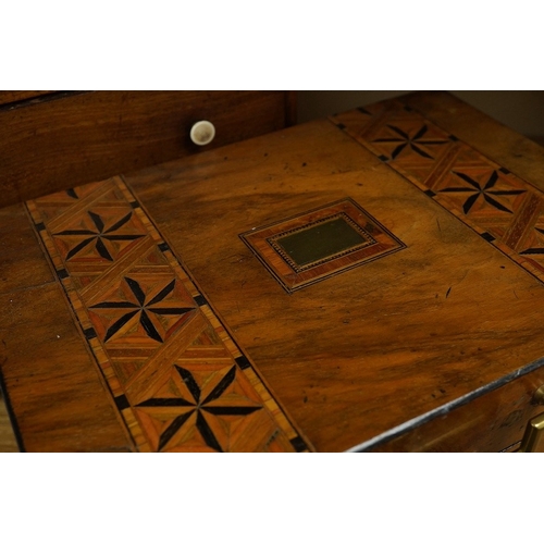 406 - A small 19th century mahogany chest of three drawers having bone handles, width 26cm, height 26cm an... 