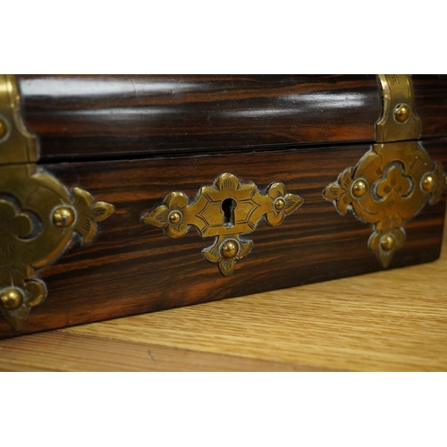 410 - A Victorian coromandel jewellery box with engraved "Gothic" strapwork, width 20cm. Conditi... 