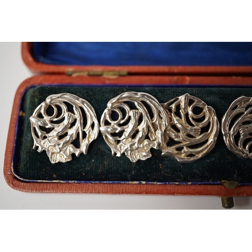 442 - An Edwardian cased set of 6 Art Nouveau silver buttons, cast with stylised scrolling flowers, James ... 