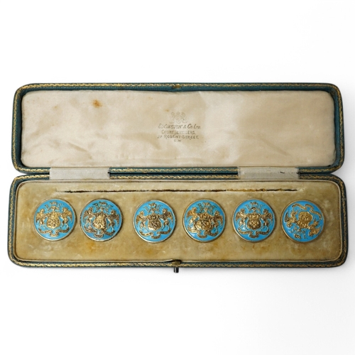 444 - A George V set of 6 blue enamelled silver gilt buttons with armorial and motto 'cumnia subjescisti s... 