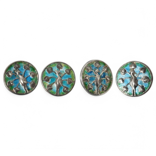 447 - A set of 4 Liberty & Co Cymric enamelled silver buttons, decorated with peacocks, Birmingham 1901, 2... 