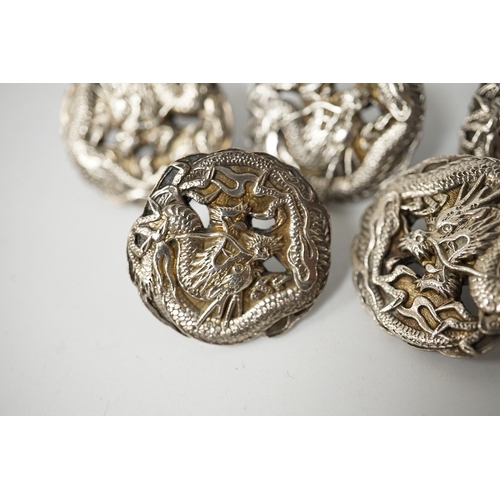 461 - A set of 5 early 20th century Japanese white metal buttons decorated with dragons, 24mm. Condition -... 