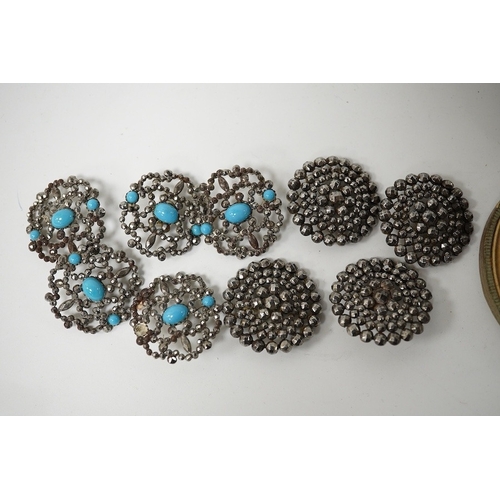 462 - An Edwardian cased set of 6 cut steel buttons with central floral motifs, 20mm, a paste inset cerami... 