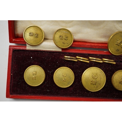 464 - A set of 22 late 19th century gilt brass 'M.C.' (Merton College, Oxford) buttons. Condition - good i... 