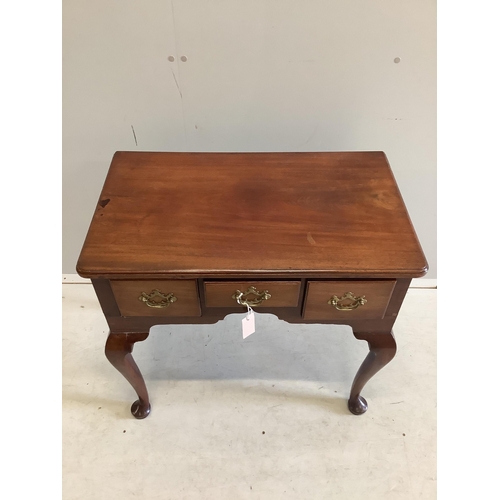 49 - A George III mahogany lowboy fitted three frieze drawers and cabriole pad feet, brass handles, width... 