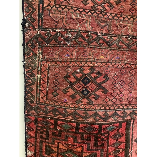 62 - A saddlebag sampler carpet, 222 x 92cm. Condition - fair