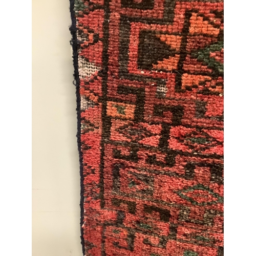 62 - A saddlebag sampler carpet, 222 x 92cm. Condition - fair