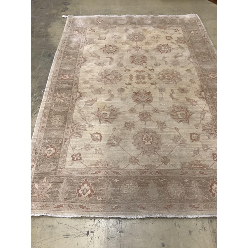 66 - A Zeigler style ivory ground carpet, 260cm x 178cm. Condition - good but has a small stained patch a... 