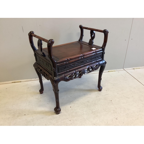 67 - A Chinese hardwood piano stool, width 64cm, depth 43cm, height 70cm. Condition - good