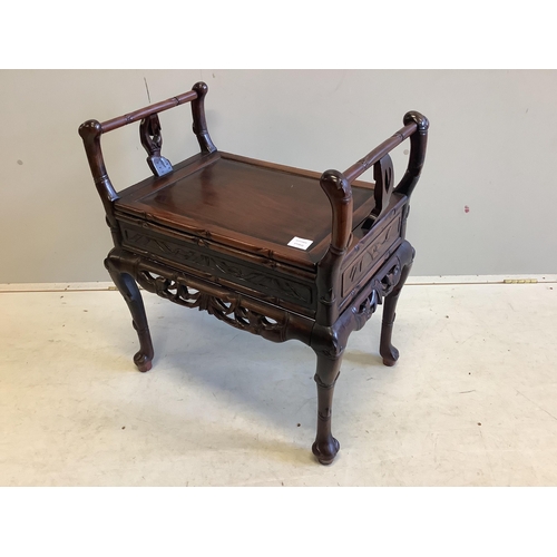 67 - A Chinese hardwood piano stool, width 64cm, depth 43cm, height 70cm. Condition - good