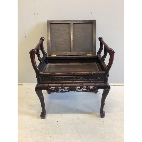 67 - A Chinese hardwood piano stool, width 64cm, depth 43cm, height 70cm. Condition - good