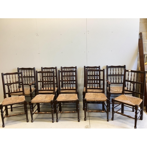 70 - A set of ten ash spindle back chairs, two with arms. Condition - fair