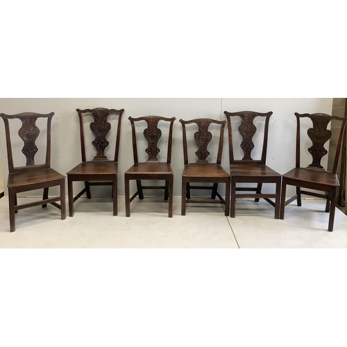 75 - A harlequin set of six country Chippendale style, carved oak dining chairs. Condition - fair