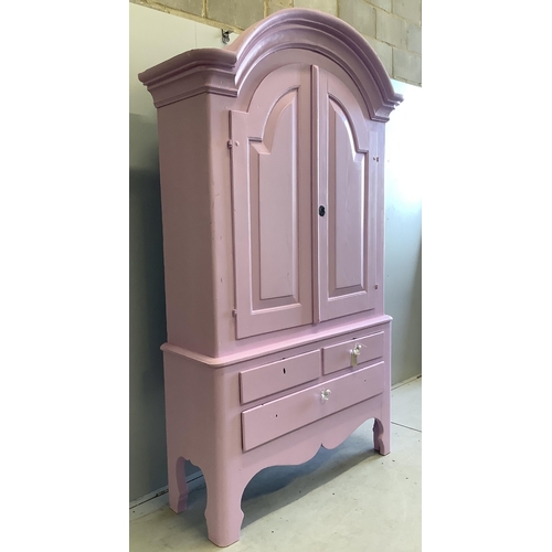 98 - An early 19th century Continental pine armoire, later painted pink, width 136cm, depth 48cm, height ... 