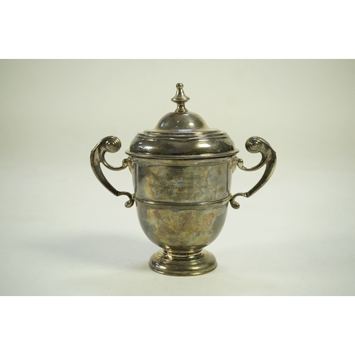 1 - A George I Irish silver two handled cup by Philip Kinnersley, Dublin, 1719, with an earlier Queen An... 