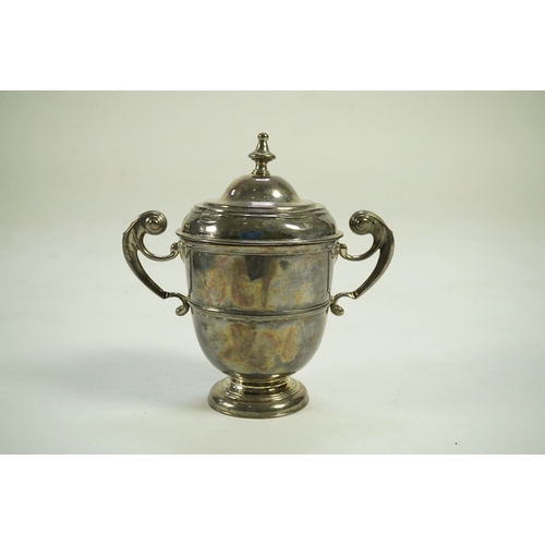 1 - A George I Irish silver two handled cup by Philip Kinnersley, Dublin, 1719, with an earlier Queen An... 