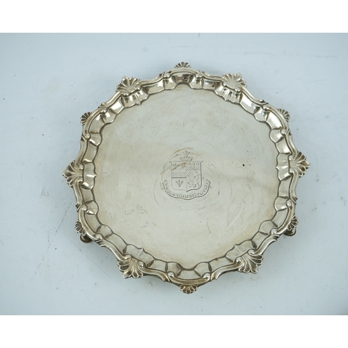 10 - A late George II silver salver, by William Peaston, of shaped circular form, with shell and scroll b... 