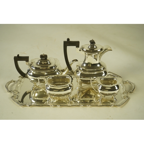 101 - An Elizabeth II silver four piece tea service and two handled tea tray, by Walker & Hall, the tea se... 