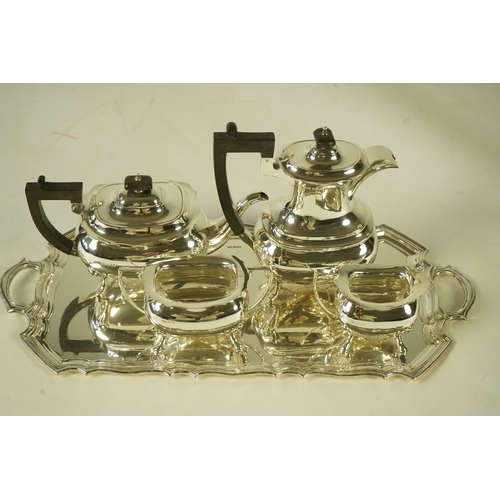 101 - An Elizabeth II silver four piece tea service and two handled tea tray, by Walker & Hall, the tea se... 