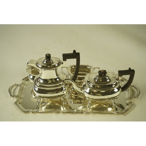 101 - An Elizabeth II silver four piece tea service and two handled tea tray, by Walker & Hall, the tea se... 