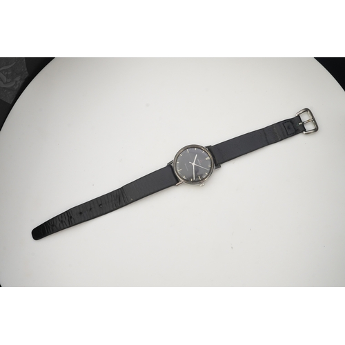 113 - A gentleman's late 1960's/early 1970's stainless steel Omega manual wind wrist watch, the black dial... 