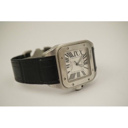 114 - A gentleman's late 20th century stainless steel Cartier Santos 100 automatic wrist watch, with signe... 