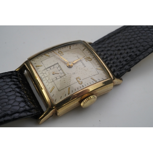 118 - A gentleman's late 1940's gold plated Longines manual wind wrist watch, on a later associated leathe... 