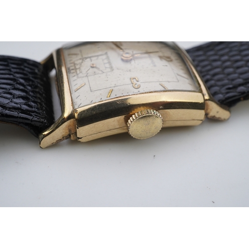 118 - A gentleman's late 1940's gold plated Longines manual wind wrist watch, on a later associated leathe... 