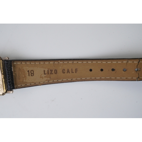 118 - A gentleman's late 1940's gold plated Longines manual wind wrist watch, on a later associated leathe... 