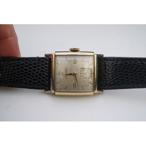 118 - A gentleman's late 1940's gold plated Longines manual wind wrist watch, on a later associated leathe... 