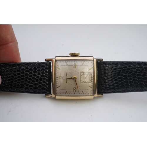 118 - A gentleman's late 1940's gold plated Longines manual wind wrist watch, on a later associated leathe... 