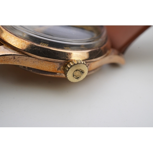 122 - A gentleman's 1940's 9ct gold Omega manual wind wrist watch, on a later associated leather strap, wi... 