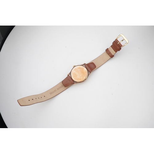 122 - A gentleman's 1940's 9ct gold Omega manual wind wrist watch, on a later associated leather strap, wi... 