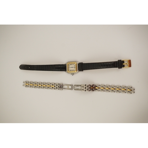 125 - A lady's steel and gold Cartier Panthere quartz wrist watch, now on an associated leather strap, but... 