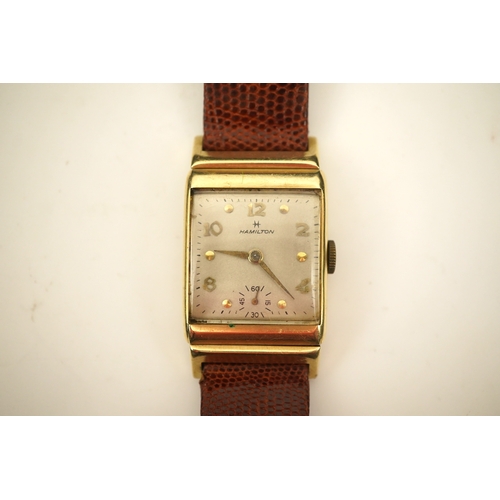 126 - A gentleman's 1950's? 14k gold Hamilton manual wind wrist watch, on a later associated leather strap... 