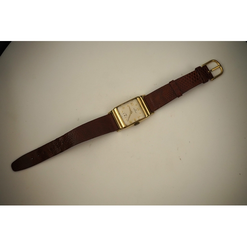 126 - A gentleman's 1950's? 14k gold Hamilton manual wind wrist watch, on a later associated leather strap... 