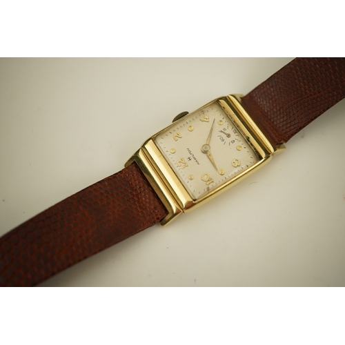 126 - A gentleman's 1950's? 14k gold Hamilton manual wind wrist watch, on a later associated leather strap... 