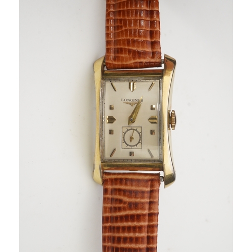 127 - A gentleman's 1950's 10k gold filled Longines manual wind wrist watch, on a later associated leather... 