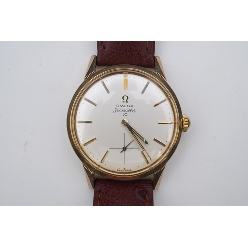 128 - A gentleman's early 1960's steel and gold plated Omega Seamaster 30 manual wind wrist watch, on a la... 