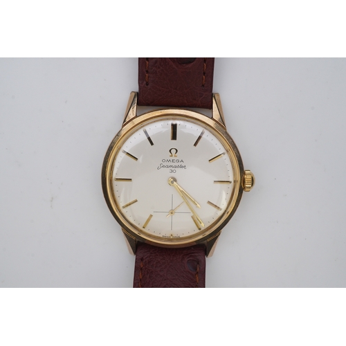 128 - A gentleman's early 1960's steel and gold plated Omega Seamaster 30 manual wind wrist watch, on a la... 