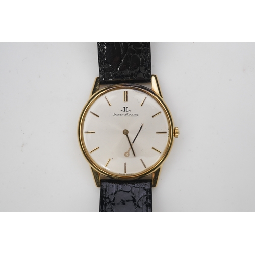 130 - A gentleman's 18ct gold Jaeger LeCoultre manual wind dress wrist watch, on a later associated leathe... 