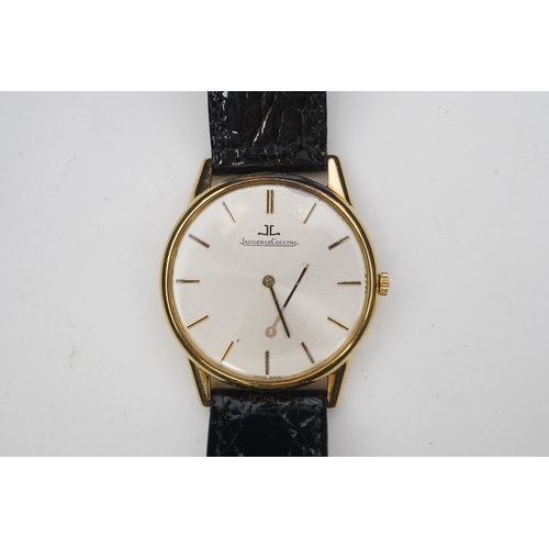 130 - A gentleman's 18ct gold Jaeger LeCoultre manual wind dress wrist watch, on a later associated leathe... 