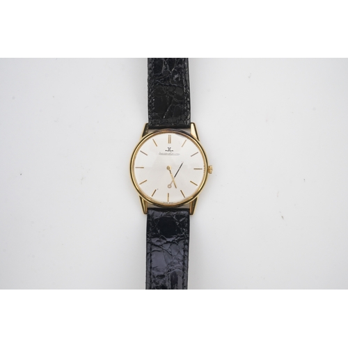 130 - A gentleman's 18ct gold Jaeger LeCoultre manual wind dress wrist watch, on a later associated leathe... 