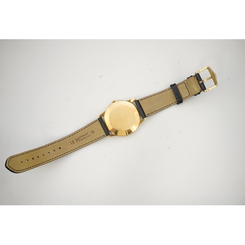 130 - A gentleman's 18ct gold Jaeger LeCoultre manual wind dress wrist watch, on a later associated leathe... 