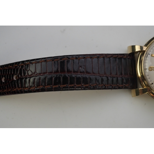 131 - A gentleman's 1950's gold plated Jaeger LeCoultre Memovox manual wind wrist watch, on a later associ... 