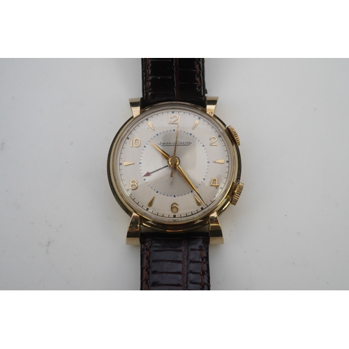 131 - A gentleman's 1950's gold plated Jaeger LeCoultre Memovox manual wind wrist watch, on a later associ... 