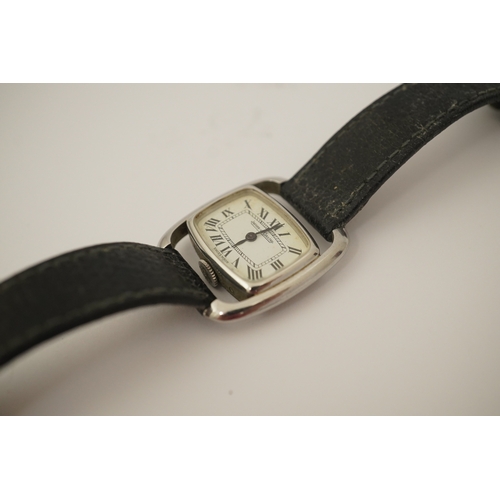 133 - A lady's stainless steel Jaeger LeCoultre Etrier manual back wind wrist watch, with shaped Roman dia... 