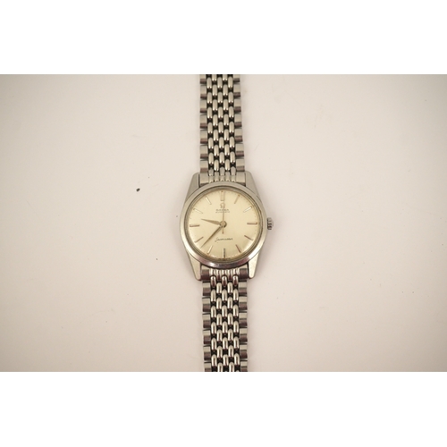 135 - A gentleman's 1960's? stainless steel Omega Seamaster automatic wrist watch, on a stainless steel Om... 