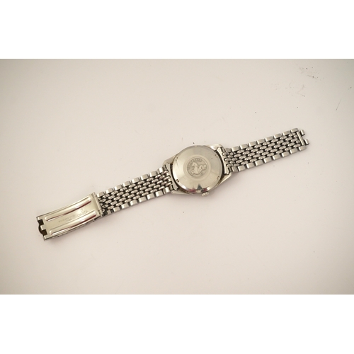 135 - A gentleman's 1960's? stainless steel Omega Seamaster automatic wrist watch, on a stainless steel Om... 